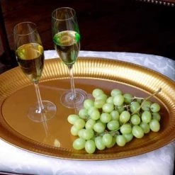 Party Dimensions Gold Oval Plastic Tray 21'' X 14''